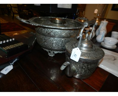 An Anglo-Indian incense cauldron, together with a white metal kettle, repoussé embossed with geometric flowers D.50cm