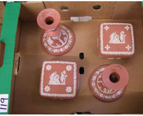 A small collection of Wedgwood Terracotta jasperware: including candle stick holders and trinket boxes (4). 