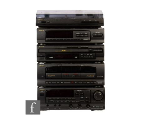 An Aiwa component Hi-Fi system comprising of a PX-E800 MKII turntable, a DX-Z7000M compact disc player, a MX-Z3000M stereo in