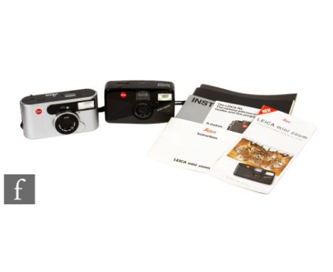 Two Leica digital cameras to include a C1 Leica camera AG, serial no. 2652009, in silver with leather case, and a Leica mini 