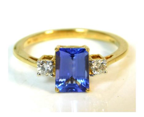 An 18ct gold tanzanite ring of approx. 1.65ct with 0.22ct of diamond, 2.7g, size N/O