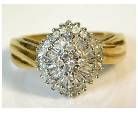 A 9ct gold cluster ring set with 0.33ct of diamond, size P/Q, 4.2g