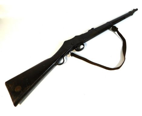 A Martini Henry short lever rifle. Barrel marked 303.  A UK firearms licence is required to own this item