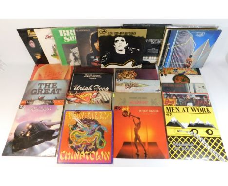 A quantity of 34 vinyl LP's, including rock &amp; prog rock, Jethro Tull, Yes, Uriah Heap, Genesis, Pink Floyd, Waylon, Be-Bo