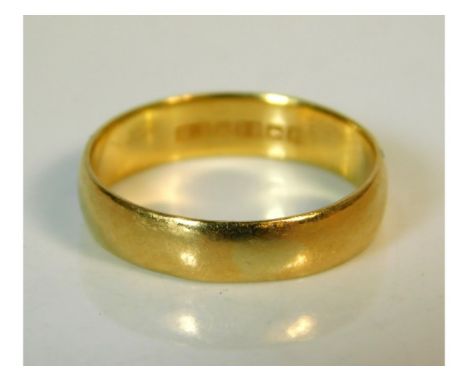 A 22ct gold band, size K/L, 2.9g