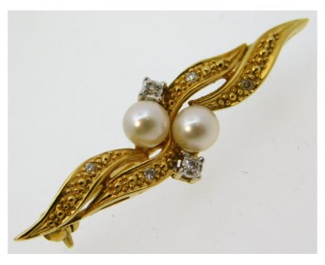 An 18ct gold Mappin &amp; Webb brooch set with cultured pearls &amp; six small diamonds, 3.1g, 31mm wide x 8mm high