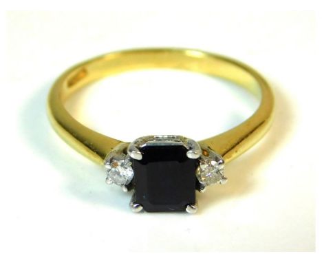 An 18ct gold ring set with sapphire &amp; two small diamonds, 2.3g, size J/K