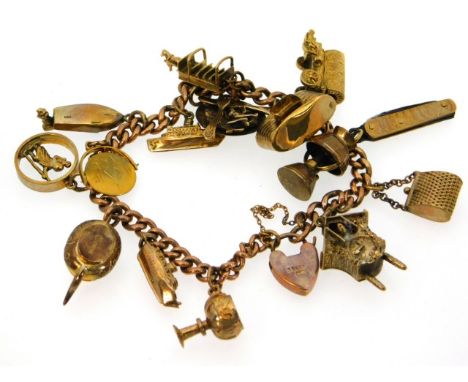 A 9ct gold &amp; yellow metal charm bracelet, camera a/f, 61.8g