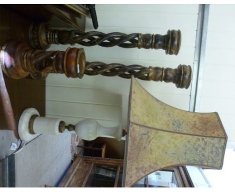 Three modern rustically turned, double twist, wooden candlestands  12'', 28'' & 30''h; and a contemporary turned onyx and bra