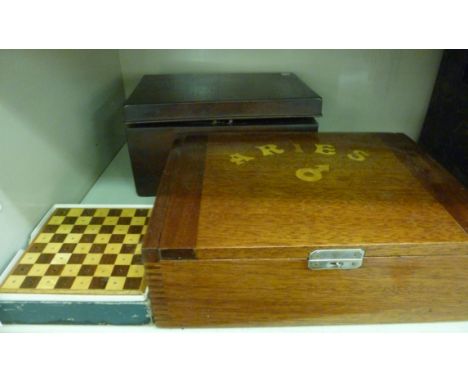 Wooden boxes: to include an early 19thC mahogany tea caddy, having a rising top enclosing two lidded compartments  5''h  9''w