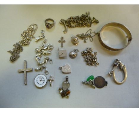 Silver, silver coloured and other jewellery: to include a bangle, charms and pendants       11