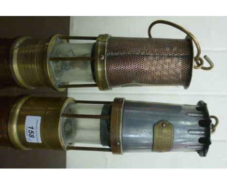 A W E Teale & Co of Swinton, copper and brass miners lamp; and a JH Naylor of Wigan, brass and polished steel lamp         CA