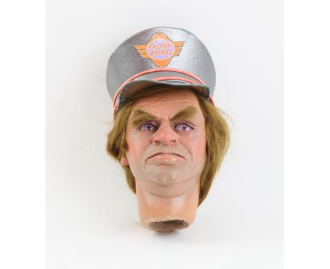 Brown haired puppet head with hat with moveable lower lip and eyes made by Phil Eason, 14 cm. Provenance: The Phil Eason Coll