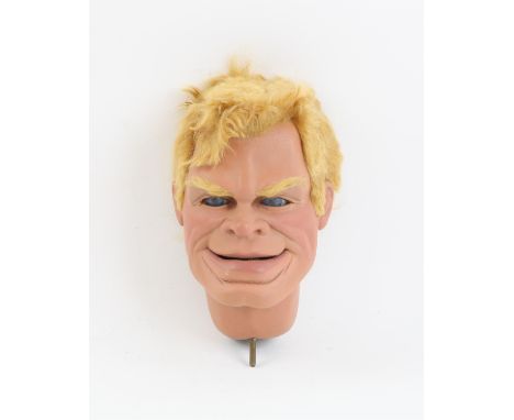 Blond haired puppet head with moveable lower lip and eyes made by Phil Eason, 14 cm. Provenance: The Phil Eason Collection. N