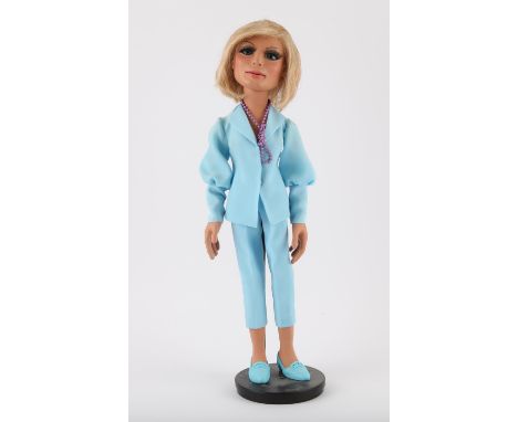 Lady Penelope puppet on wooden stand, hand constructed by Phil Eason, approx. 52 cm. Lady Penelope Creighton-Ward is a fictio