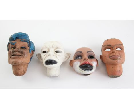 4 Puppet heads with moveable lower lips made by Phil Eason, largest 14 cm (4). Provenance: The Phil Eason Collection. No copy
