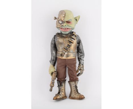 Green alien studio puppet with moveable mouth, 48 cm. Provenance: The Phil Eason Collection. No copyright is assigned with th