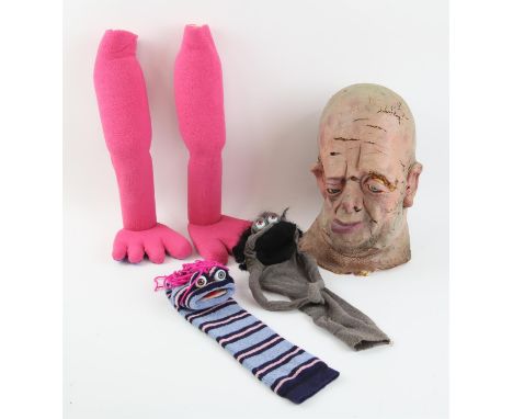 Two sock puppets, pink foam legs and a latex puppet head (4). Provenance: The Phil Eason Collection. No copyright is assigned