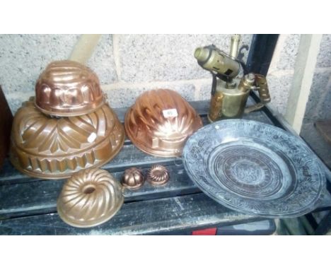 6 COPPER JELLY MOULDS OF VARIOUS SIZES, BRASS MONITOR MILITARY MARKED PARAFFIN BLOW LAMP &amp; WHITE METAL DISH