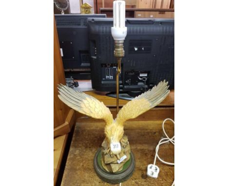 TABLE LAMP OF A GOLDEN EAGLE ON BRASS BASE