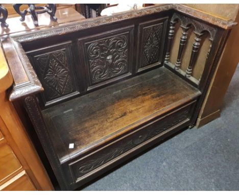 CARVED OAK MONKS BENCH WITH HINGED SEAT &amp; STORAGE