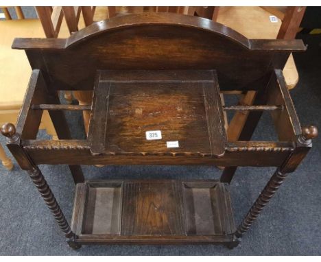 1930'S CARVED OAK STICK STAND WITH TURNED LEGS