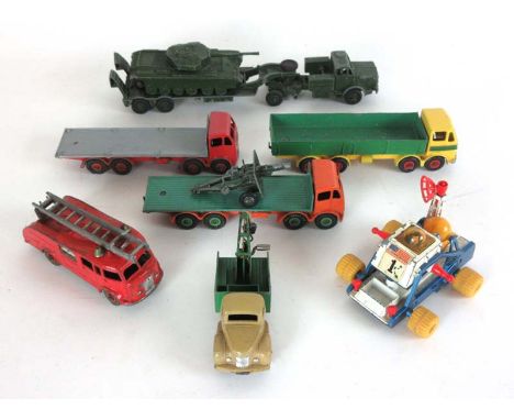A group of unboxed Dinky Supertoys diecast vehicles including a Leyland Octopus, two Foden flatbeds, a 955 Fire Engine a Tank