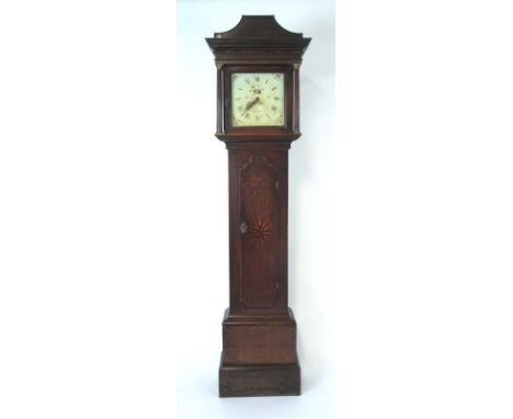 An 18th century oak and marquetry long case clock, the dental cornice over an enameled face with Roman numerals, painted span