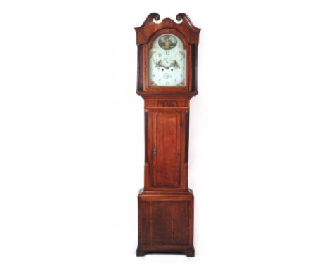 An 18th century oak and mahogany long case clock, the swan neck pediment over an enameled and hand painted face with Arabic n