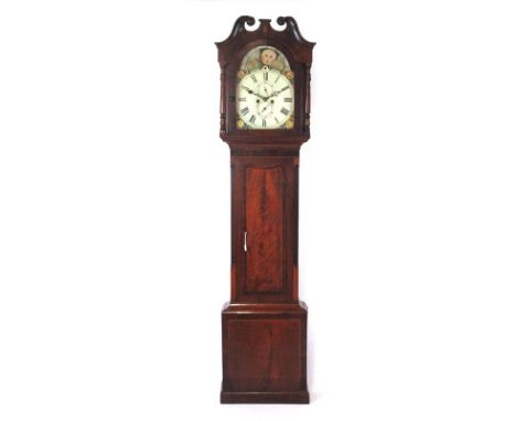 An early 19th century mahogany and crossbanded longcase clock, the swan neck pediment over an enameled and hand painted face 