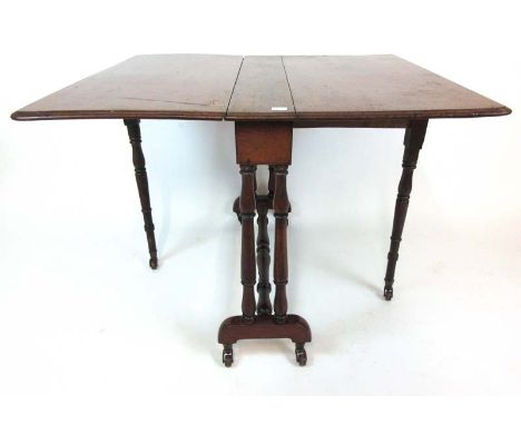 A 19th century mahogany Sutherland table, the drop leaves supported on turned legs with ceramic castors, h. 72 cm, max l. 102