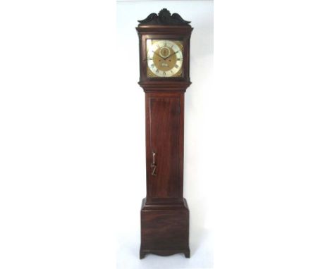 An early 20th century mahogany longcase clock with brass and silvered face having Roman and Arabic numerals, second dial, pie