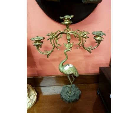 A PAIR OF GILT BRASS TWO BRANCH THREE LIGHT CANDELABRA, c1900, each in the form of a flamingo supporting two arms with scroll