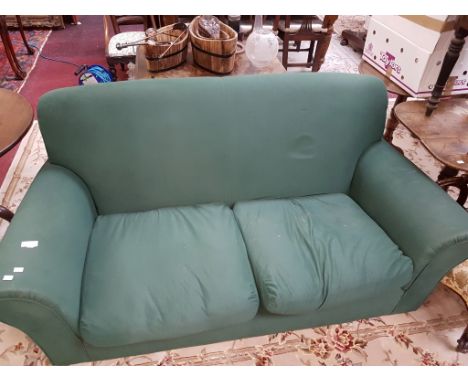 A LARGE TWO-SEAT EASY SETTEE, covered in green fabric, with padded back and cushion seat. (1) 