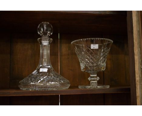 A CAVAN CRYSTAL STEM BOWL,together with a Waterford crystal ship's decanter and stopper. (2) 
