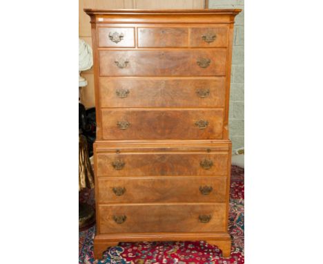 A LATE EIGHTEENTH CENTURY STYLE WALNUT CHEST-ON-CHEST, O.R.M., the moulded cornice above an arrangement of three long and thr