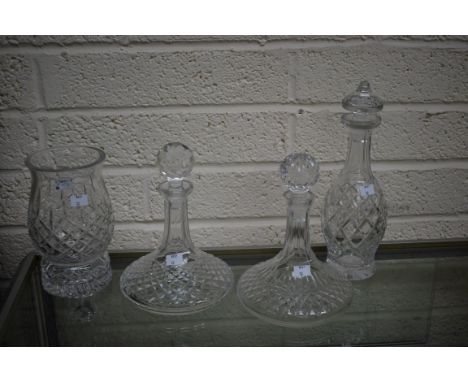TWO SIMILAR WATERFORD CRYSTAL SHIPS DECANTERS, each with stopper; another Waterford crystal decanter and stopper, 13" (33cm);