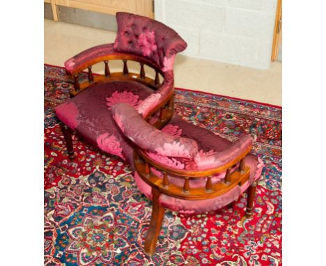 A MAHOGANY TWO-SEAT CONVERSATION OR LOVER'S SETTEE, the S-shaped frame with horse-shoe shaped button back and baluster rail, 