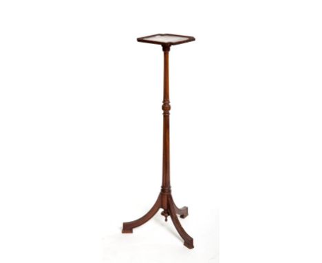 A TRIPOD JARDINERE STAND OR TORCHERE, the square top with angled corners and two-stage turned stem above a tripod base, 42” (