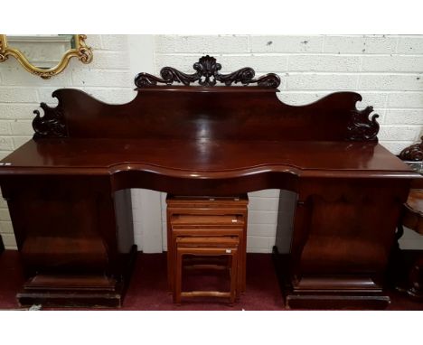 A LARGE GOOD QUALITY VICTORIAN MAHOGANY PEDESTAL SIDEBOARD, the shaped back with central shell crest, issuing scrolling folia