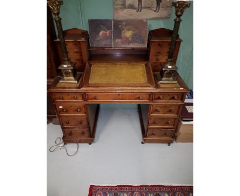 A VICTORIAN DICKENS-TYPE WALNUT PEDESTAL WRITING DESK,  the superstructure with shelf and gallery flanked to either side with