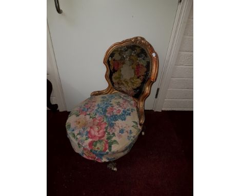 A SMALL VICTORIAN GILT OCCASIONAL CHAIR, with tapestry padded back, and circular seat, raised on front cabriole legs; and ano