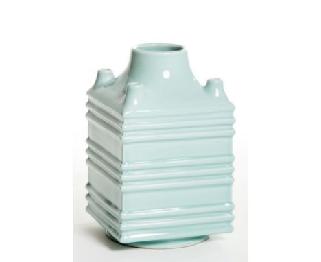 A VERY UNUSUAL LIGHT BLUE SQUARE-FORM VASE, with large circular neck, and four smaller spouts, on a reeded body and circular 