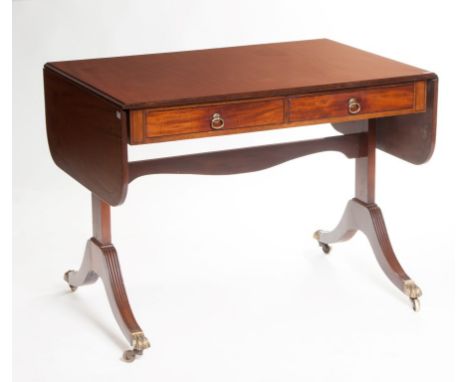 A FINE EBONY STRUNG MAHOGANY SOFA TABLE, by Waring and Gillows of Liverpool, stamped on the drawer edge, also with Waring and