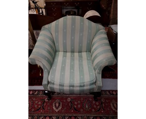 A PAIR OF UNUSUAL LIBRARY ARMCHAIRS IN THE QUEEN ANNE STYLE, each with wide cushion seat and an arched back, with scroll arms