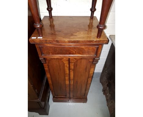 A SMALL WILLIAM IV PERIOD MAHOGANY PEDESTAL, with frieze drawer above two arched panel doors, raised on a plinth, 39” (99cm) 