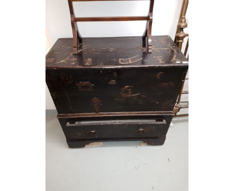 A CHINESE LACQUERED LIFT-TOP MULE CHEST, the entire chest relief decorated and lacquered with figures in boats, other figures