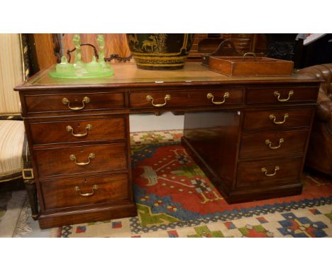 A GOOD GEORGIAN STYLE MAHOGANY PARTNERS PEDESTAL DESK, the rectangular moulded top with cross-banded edge and inset with tool