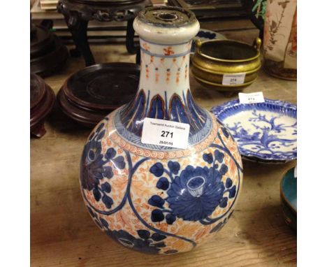 An 18th century Qian Long period Chinese Imari vase - hole in back where had been converted to a table lamp.