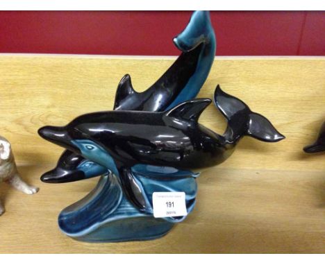 A Poole Pottery pair of entwined dolphins
